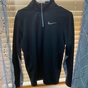black and grey half zip nike jacket